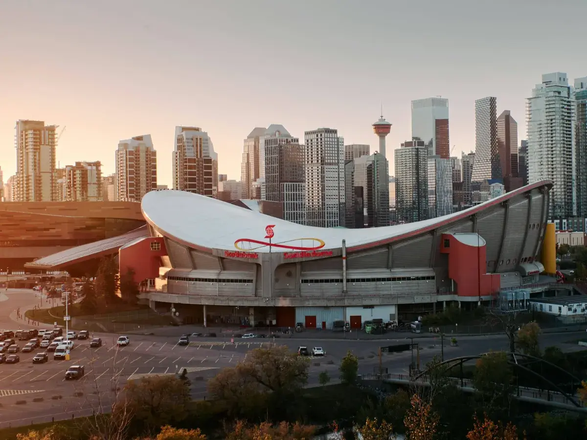 The Calgary skyline and Saddledome at sunset