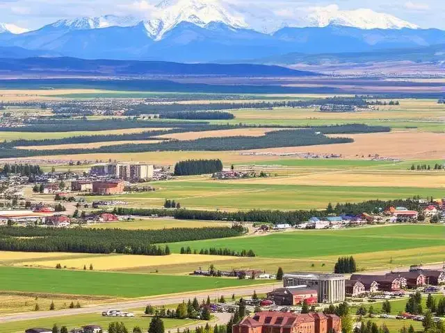 Okotoks, Alberta from above, foothills and mountains beyond